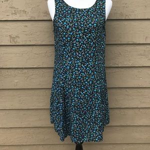 A dark blue dress with a flower pattern